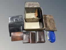 A collection of vintage leather purses and wallets etc