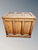 A late Victorian panelled oak blanket chest,