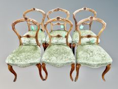 A set of six Victorian carved stained beech dining chairs in green dralon
