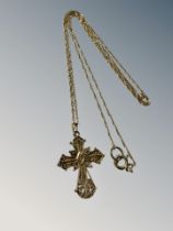 A yellow gold crucifix pendant on chain, 4.3g.