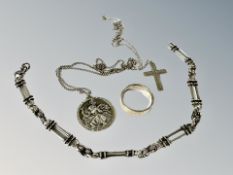 A silver fancy link bracelet together with a St.