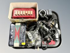 Two accordions, Prakitca MTL 5 camera, further camera bodies and lenses,
