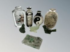 Four Chinese scent bottles and several jade carvings