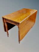 A 19th century mahogany drop leaf table,