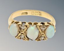 An antique 18ct gold opal and diamond ring,