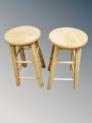 A pair of pine stools