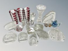 A collection of glass paperweights, vase,