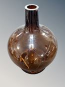 Two pairs of contemporary table lamps and a large amber glass carbouy