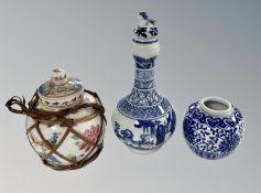 A Chinese blue and white porcelain bottle vase together with a further bulbous vase and polychrome