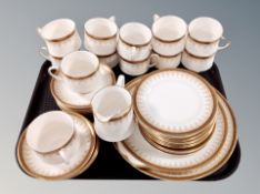 Forty two pieces of Paragon Athena white and gilt tea and dinner china