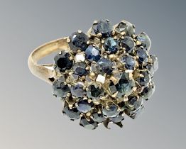 A 14ct gold sapphire cluster ring (one stone deficient),