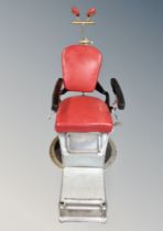 An early 20th century C Ash & Sons revolving barber's chair