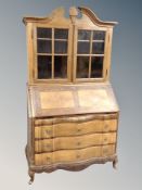A 19th century Scandinavian oak bureau bookcase,