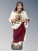 A painted plaster figure of Jesus Christ,
