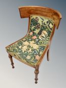 A 19th century walnut salon chair in Arts and Crafts upholstery
