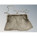 A silver mesh purse