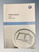 Ten VW Tiguan Driver's Manuals/Owner Booklets in Original Wallets.