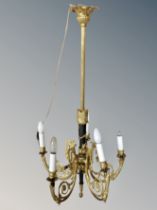 A gilt brass five branch chandelier,