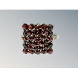 A vintage silver garnet cluster ring, size V/W.