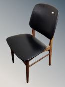 A Danish teak and black vinyl dining chair and one further chair
