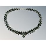 A black cultured pearl necklace