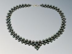 A black cultured pearl necklace