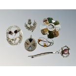 A collection of Scottish brooches, some examples in silver, agate etc.