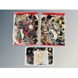 A collection of costume jewellery in three boxes, necklaces,