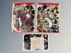A collection of costume jewellery in three boxes, necklaces,