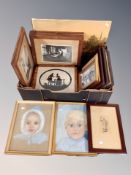 A box of monochrome photographs, framed silhouette pictures,
