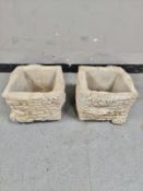 A pair of concrete brick and ivy planters height 25 cm