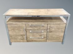 A chrome and rosewood effect entertainment sideboard,