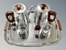 A Sona Art Deco style stainless steel four piece tea service on tray
