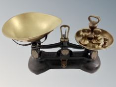 A set of Victorian cast iron and brass Alveston scales and a quantity of graduated weights