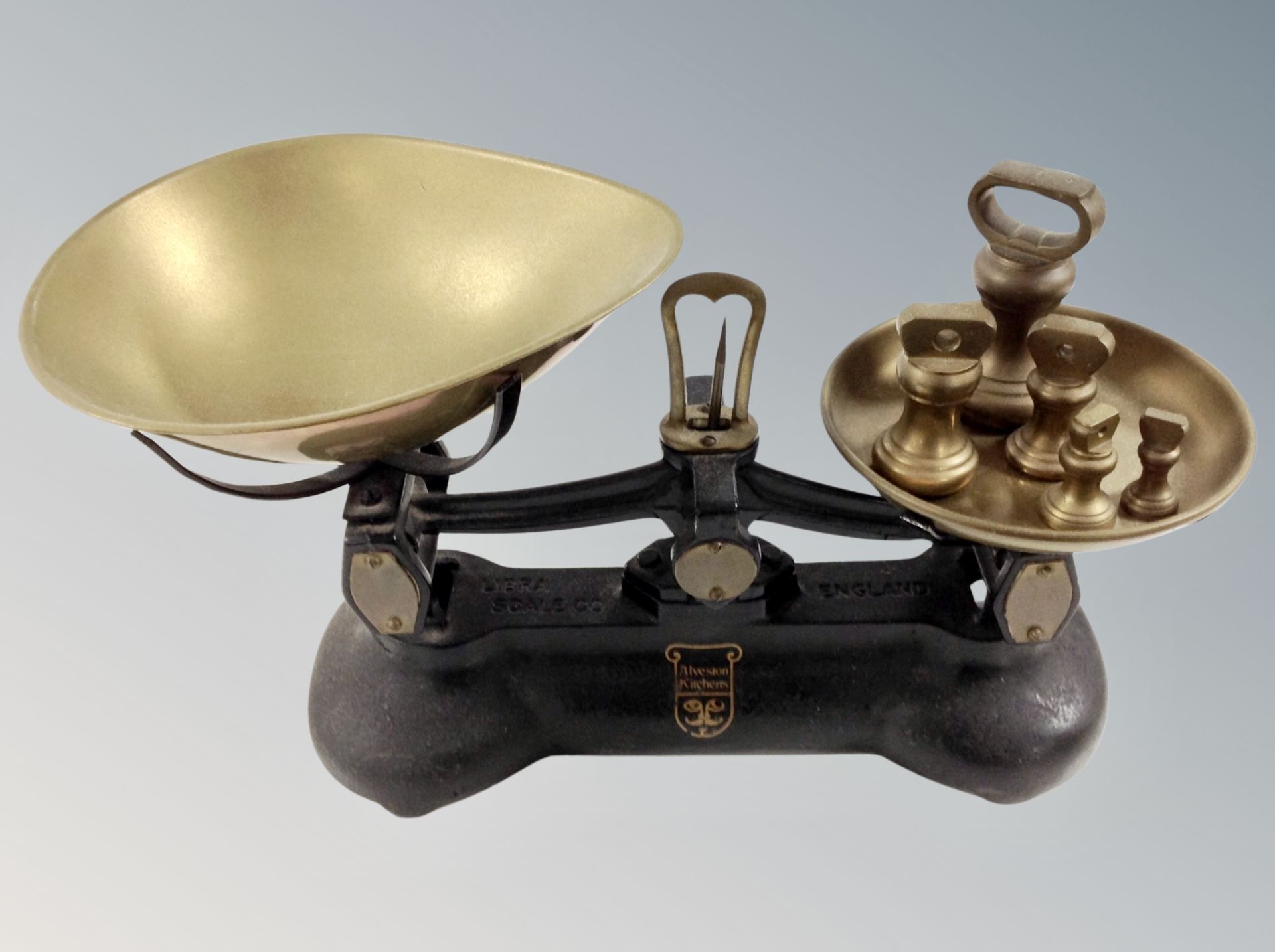 A set of Victorian cast iron and brass Alveston scales and a quantity of graduated weights