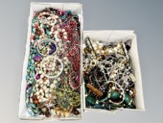 Two boxes of costume jewellery, necklaces,