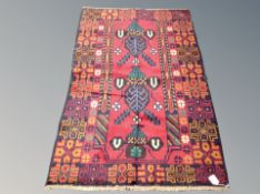 A Baluchi rug 142 cm x 87 cm