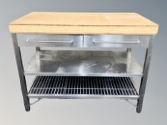 A stainless steel pine topped three tier preparation table fitted with drawers,