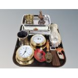 A brass cased barometer and similar quartz clock together with a group of metal wares including