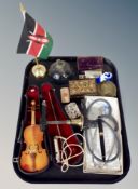 A miniature violin in case together with a whistle, tins safety razor,