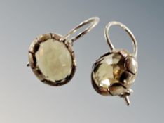 A pair of old silver earrings