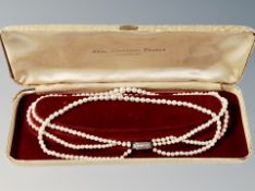 A triple strand cultured pearl necklace