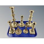 Seven assorted Victorian brass candlesticks