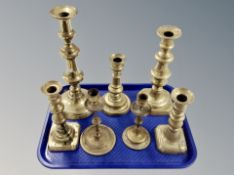 Seven assorted Victorian brass candlesticks