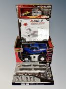 A boxed remote controlled helicopter, further Quadcopter,