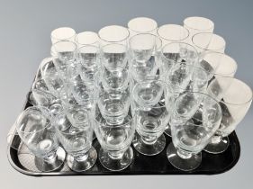 A quantity of Scandinavian drinking glasses