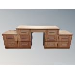 A contemporary seven drawer dressing table,