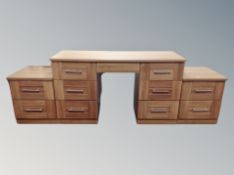 A contemporary seven drawer dressing table,