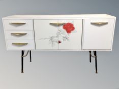 A 1960's Italian melamine sideboard fitted cupboards and drawers,