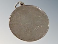 A silver pendant